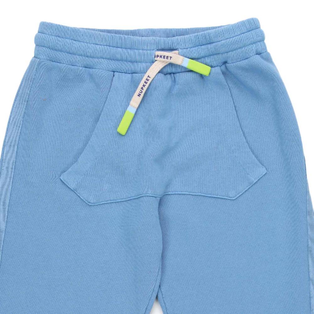 Nupkeet Pantalone Pemba indaco con marsupio In Saldo