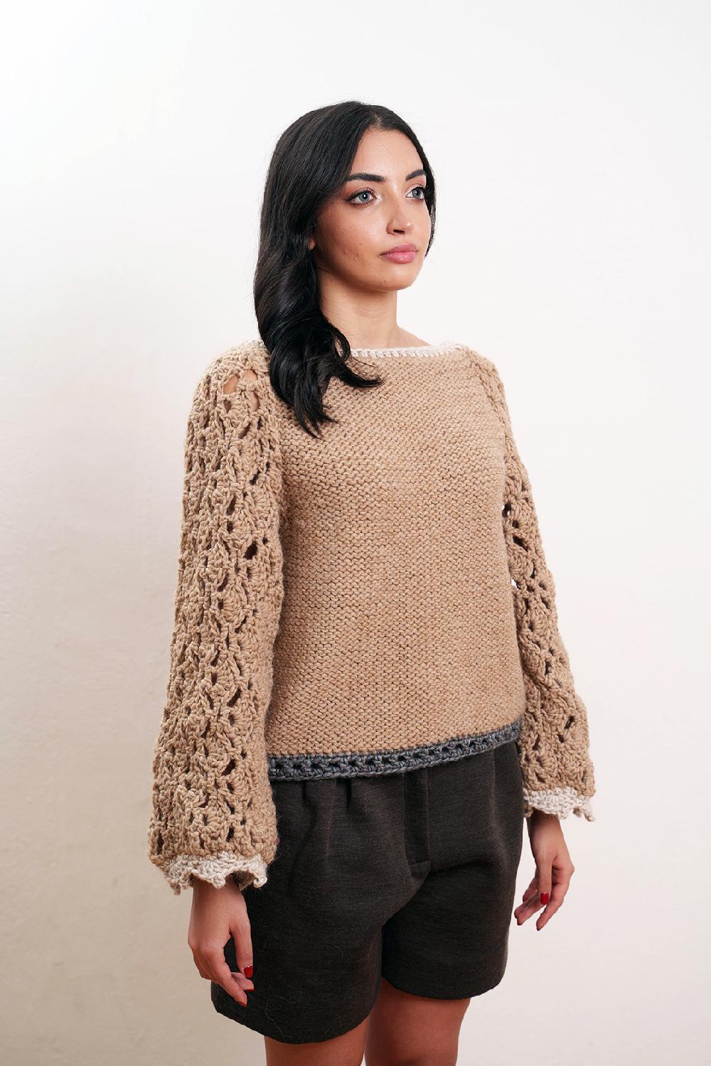 Tricot à Porter Maglia traforata scollo a barca manica ampia fondo diritto Promozione Limitata