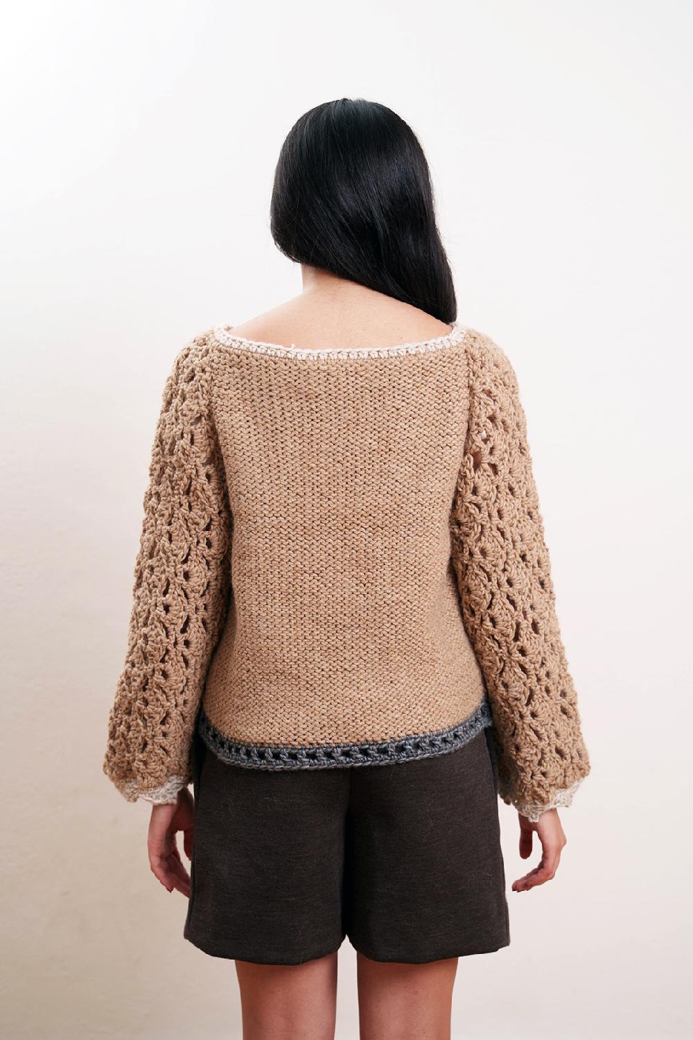 Tricot à Porter Maglia traforata scollo a barca manica ampia fondo diritto Promozione Limitata